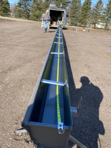 seamless gutter roll-formed on-site from back of van