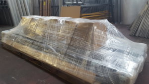 Packaged pallet of aluminium rainwater goods checked and ready for delivery